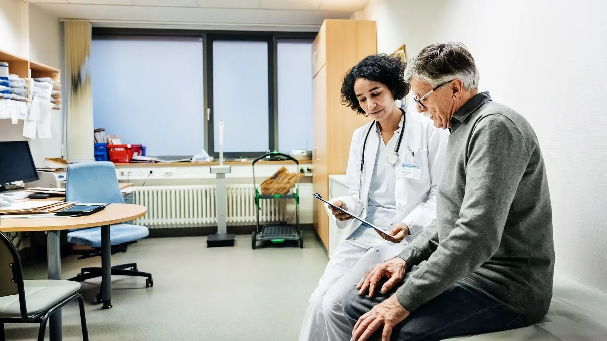 Man speaking with his Doctor
