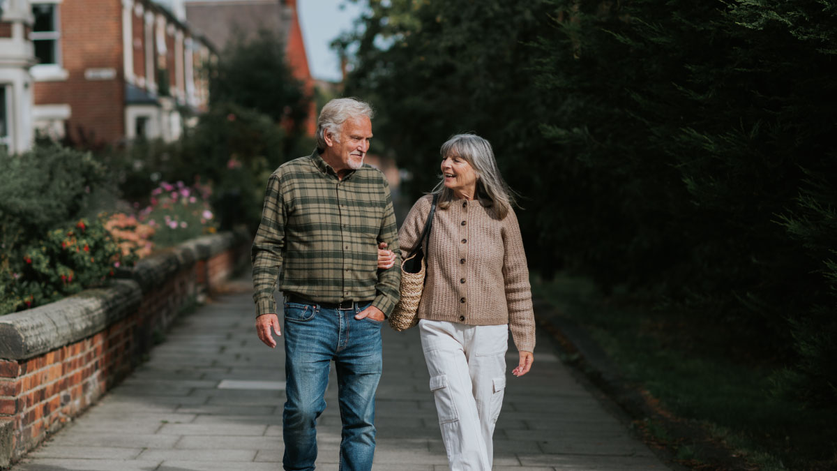 Happy retirees walking