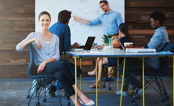 Smiling woman in a meeting
