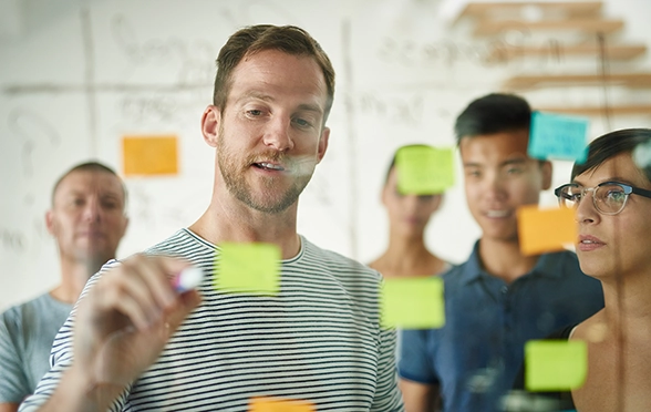 Colleagues at a whiteboard