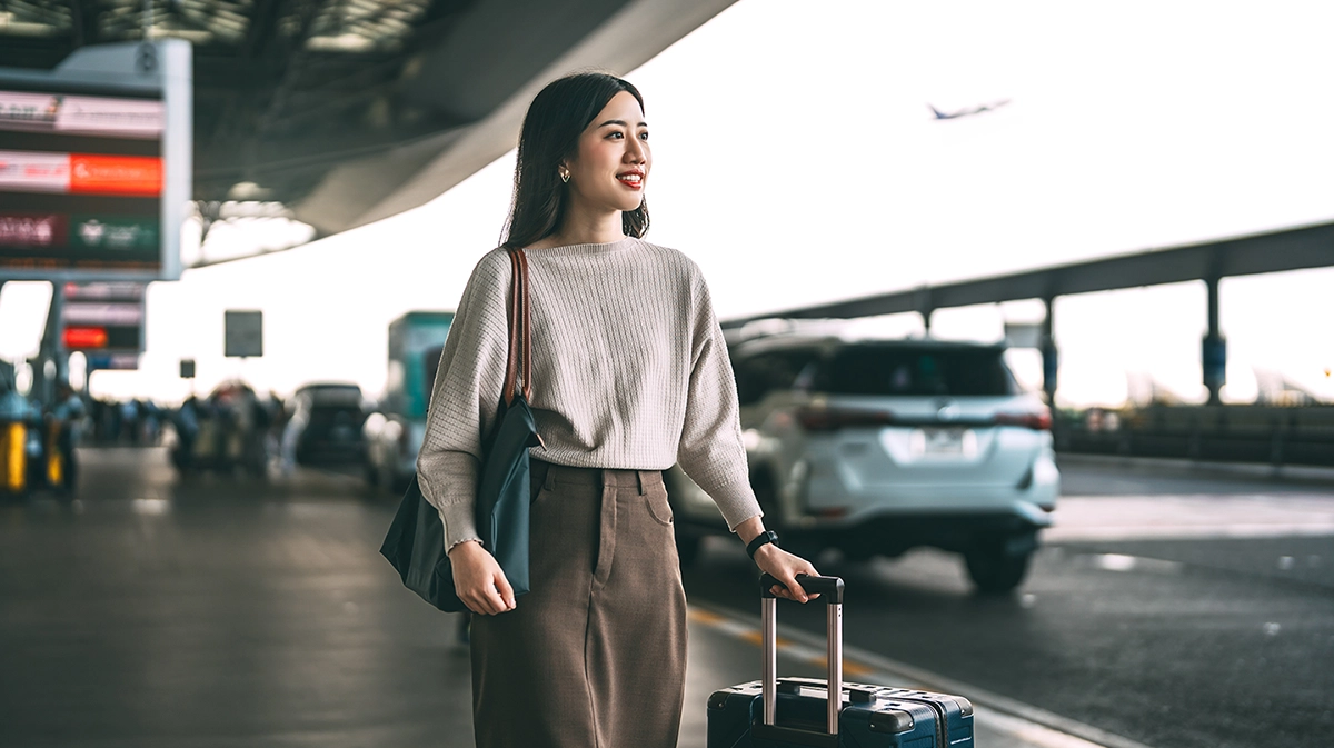 Woman exits airport