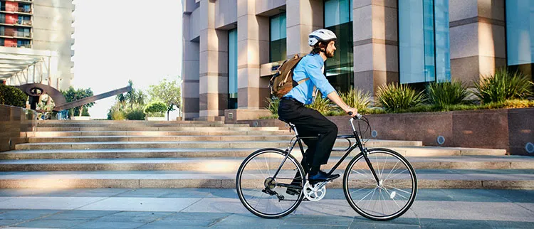 man cycling to work