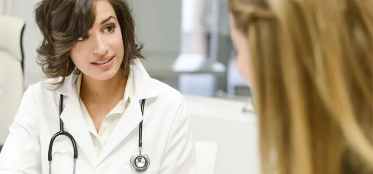 doctor speaking with a patient and offering advice