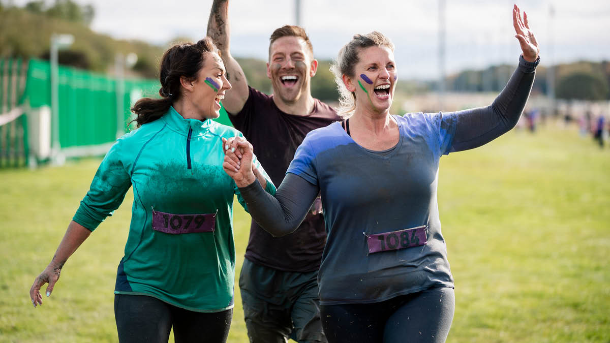 Women celebrating while practicing sports