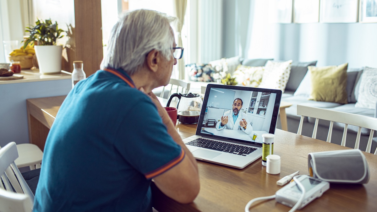 Man speaking with his Doctor on a videcall