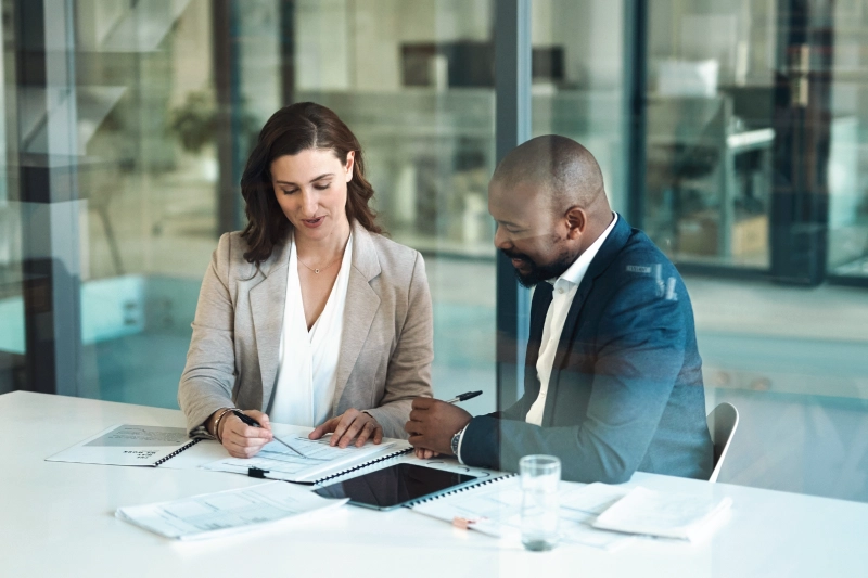 Two brokers sitting together