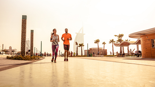 A couple doing outdoor exercise together