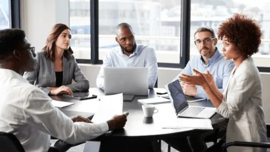 employees in business meeting 