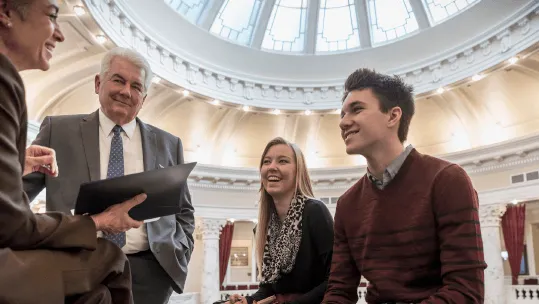 student meeting government officials