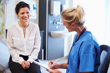 female doctor discussing with patient 