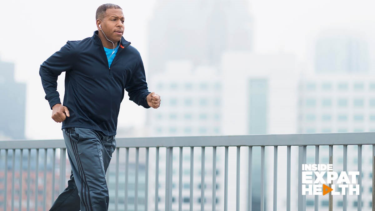 Man runs across bridge to exercise and reduce stress