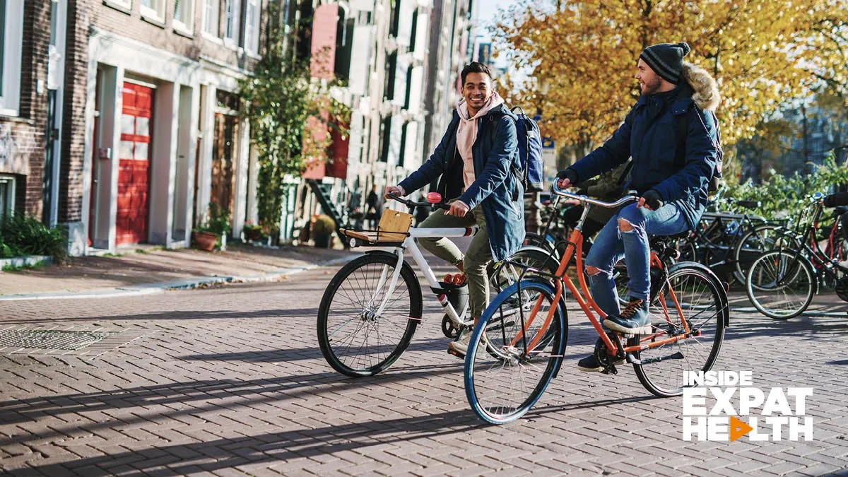 Young couple cycling in town for health and fitness