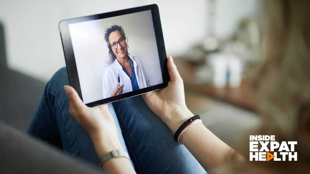 Female accessing telehealth for consultation with doctor