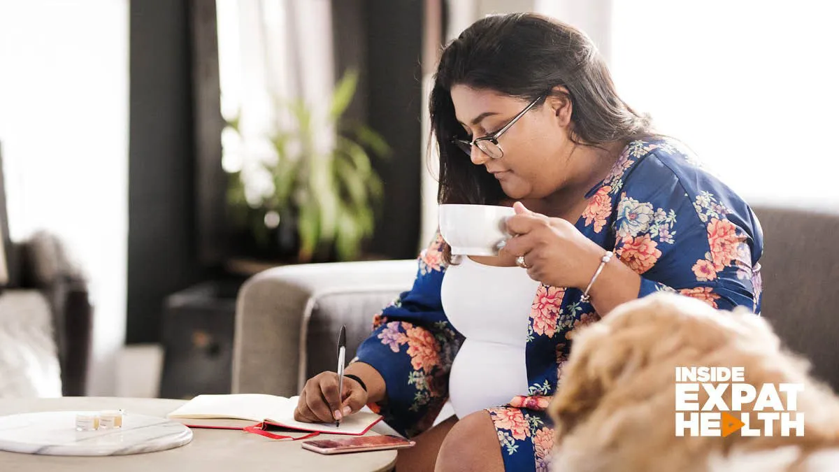 Woman writes a list to focus and be prepared