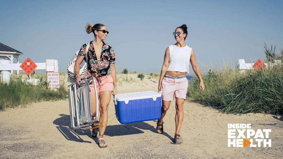 Two women head to the beach for downtime