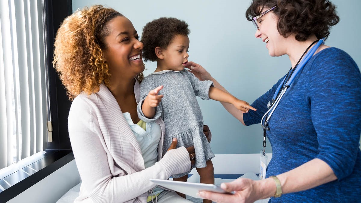 Mother and young child at a doctor visit