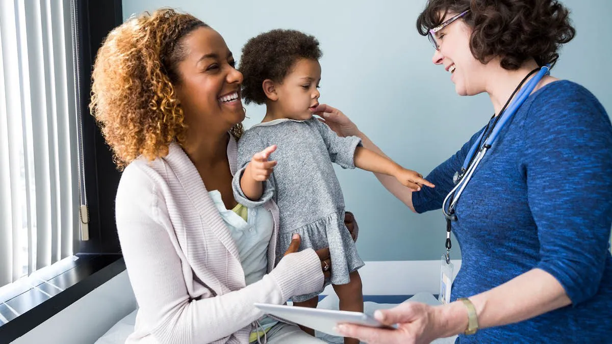 Mother and young child at a doctor visit