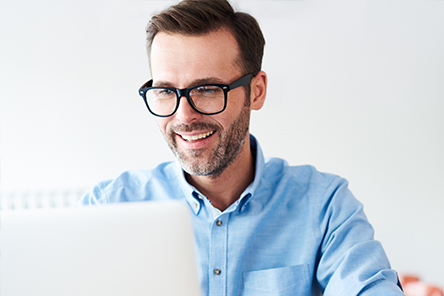 man looking at computer screen