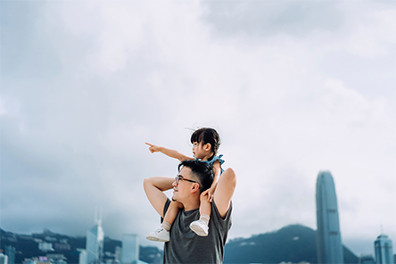 man playing with his daughter